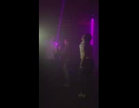 Man danced in the club filmed with a phone in a flash