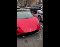 Guy sees parking ticket on red lamborghini