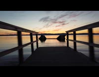 Drone view of the beach at sunset