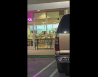 girl inside tea store pic of cup