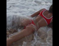 (DO NOT CLAIM) Two women bikini beach waves fail video