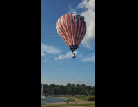 Hot air balloon almost lands in water fountain