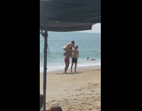 White bikini girl struggles to sit shoulders 