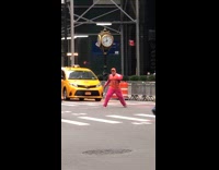Guy holds basketball sings orange jersey shirt 
