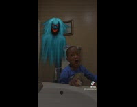 Blue shirt kid scared by laughing ghost prank
