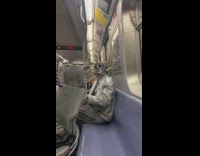 Two human statue street performer guys subway 