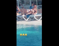 Woman bite and pour wineglass with mouth