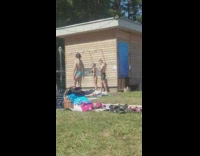 Girl black bikini outdoor shower grass basket