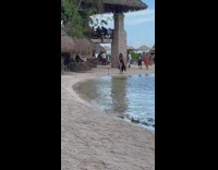 Woman black bikini dance on beach gazebo