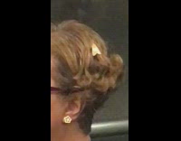 Lady glasses subway moth bug in hair