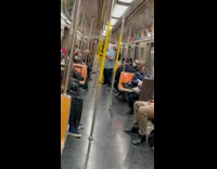 Collab Subway Creatures - Man with bunny ears sings and slaps ukulele subway