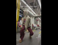Lady Dances in Train then Touches the Ground