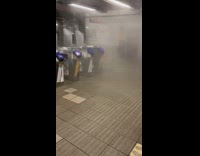 Smoke Comes Out from Subway Station 