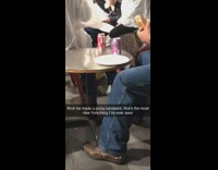 Brown shoes jeans guy makes pizza sandwich 