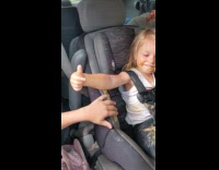 Little girl with peanut butter on her