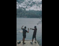 Guy swings on rope and does double backflip