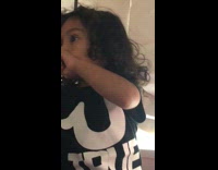 long haired boy closes blinds