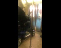 man in large electric wheel chair