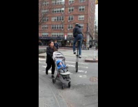 Man crossing street on unicycle
