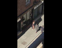 Girl jogger photo with glass door reflection