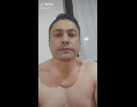 Man Stretches Neck In Sync with Beat