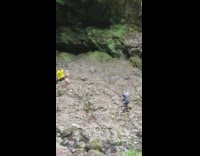 Guy yellow shirt coach girl squat waterfalls