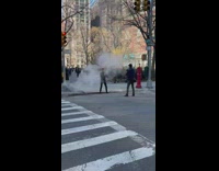 Guy poses for video shoot in smoke on one leg and prayer hands
