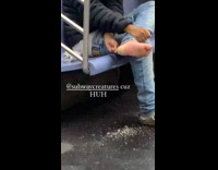 Man peeling of dead skin on foot 