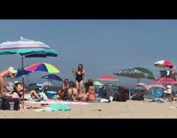 Group of friend bend over beach pictorial