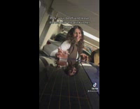 Girl takes out cup from purse 