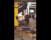 Man doing ab crunches in chair while playing the trumpet