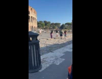 Collab IITW - Man tiktok dance with Colosseum behind them