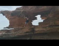 Guy does pull ups on rock fail 