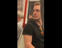 Pt. 2 Guy drinking monster energy drink has black rat on his shoulder on the train