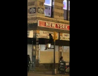 Collab WINY - Man Sits on Top of Crosswalk Stoplight