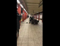 Guy takes off shoes socks and picks at feet in subway station