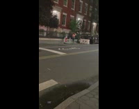 Lady in red records herself dancing at night for video 