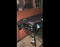 Friends fold white sweater guy in couch 