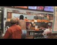 Shirtless guy in underwear steals food from Popeyes 
