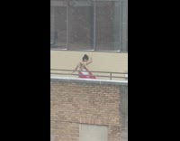 Woman traditional clothes film dance outside snowstorm
