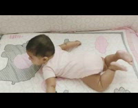 Baby dances kicks legs baby shark