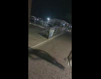 Guy leans on rail falls down stairs 