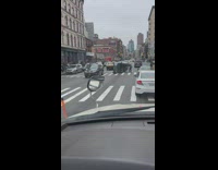 People Gather Around Car and Helps People in it