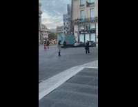 Black boots girl walks back forth courtyard 