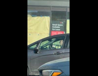 Car driver use drumsticks on steering wheel