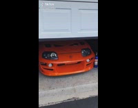 Man Opens Garage and Shows Two Beautiful Cars