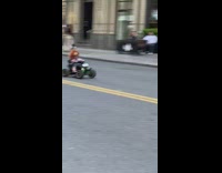Chucky Doll Drives Remote Control Car on Street 