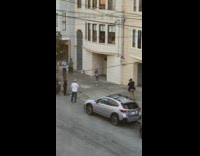 Woman dress purple wig performance grey car