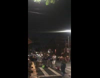 People dance street to live music 