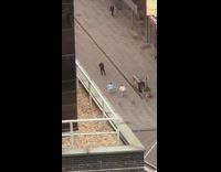 Two people dance in sync blue pink 